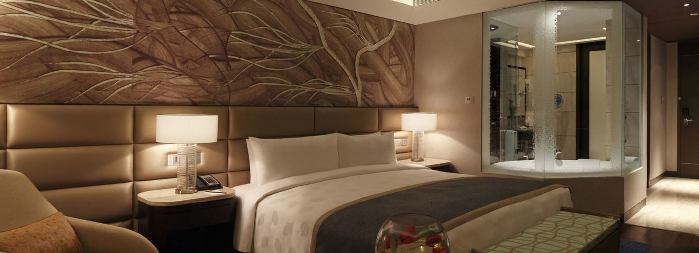 The Leela Ambience Convention Hotel Delhi Új-Delhi Kültér fotó A bedroom at the hotel